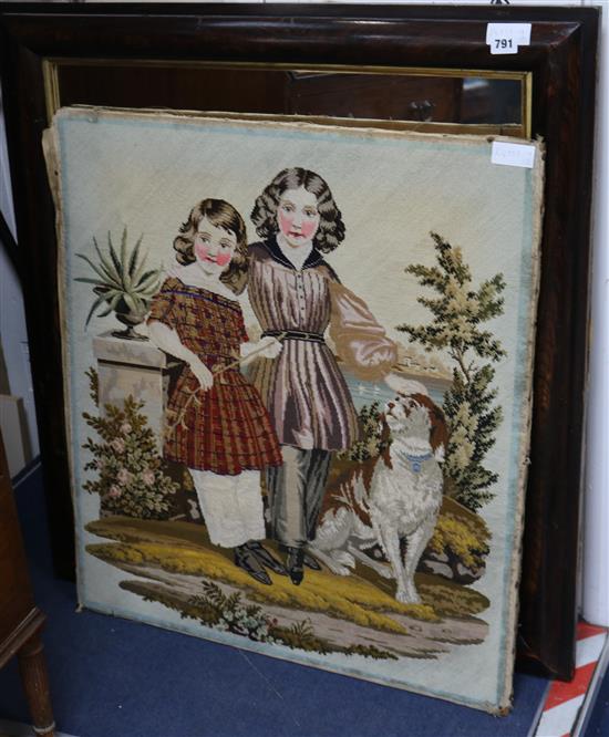 A rosewood framed mirror and a Victorian tapestry